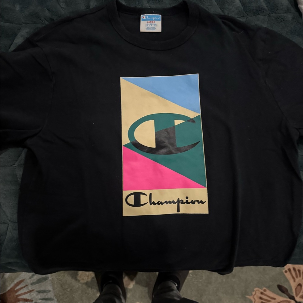 Champion Black Tee with Multicolor Geometric Logo